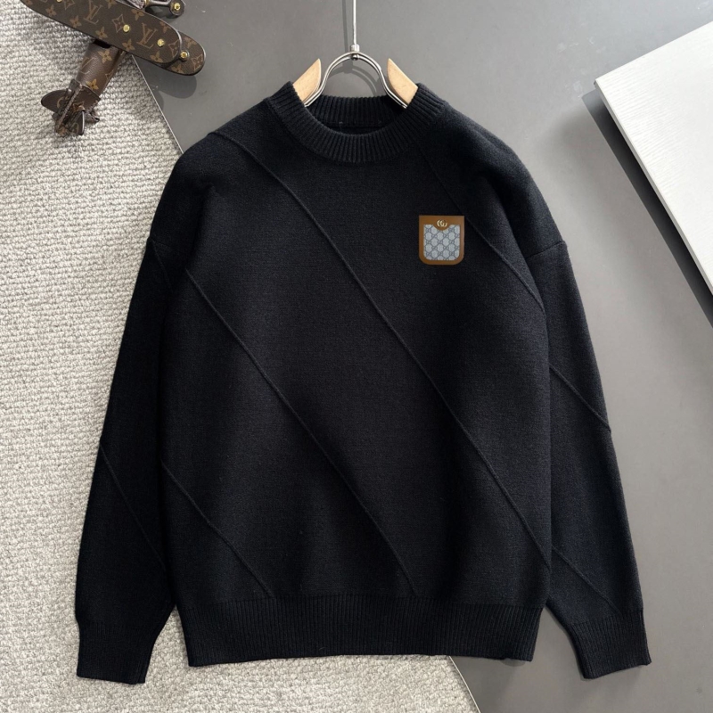 G*u*i sweaters